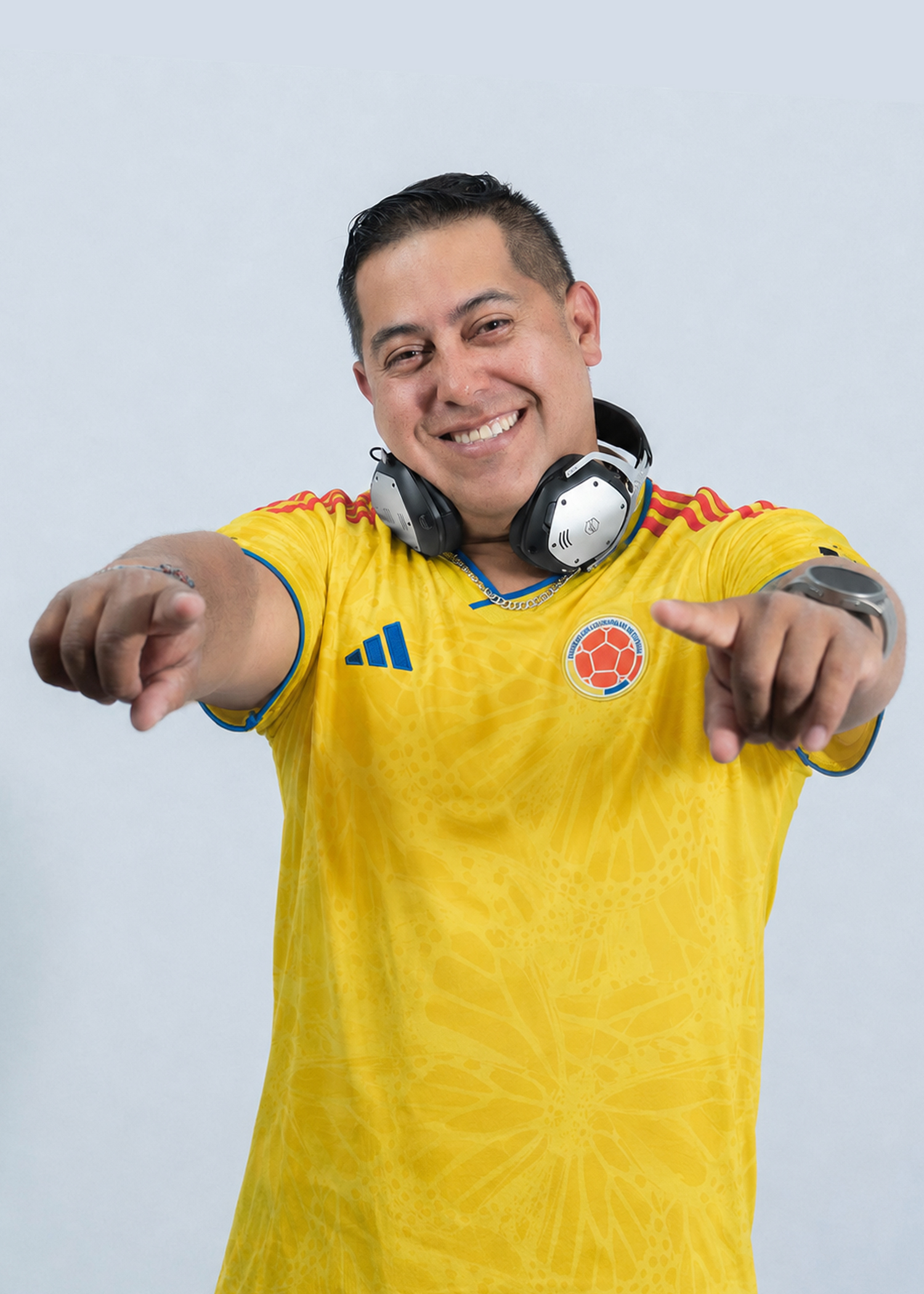 DJ Xander in a Colombia jersey with headphones